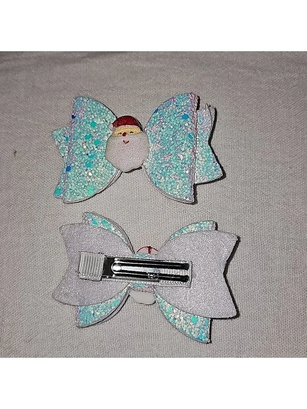Pair of cute santa iridescent hair bows